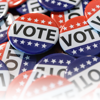 Red, white and blue vote buttons. 
